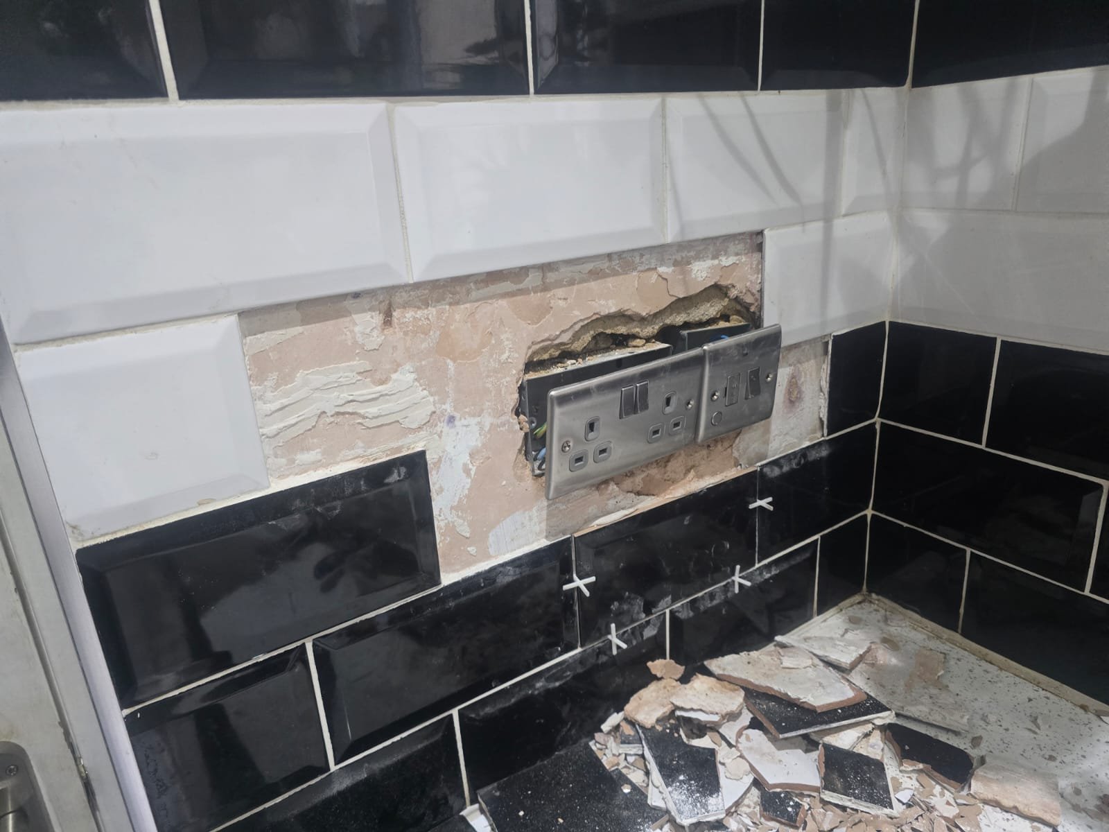 Kitchen tiling before — wall repair